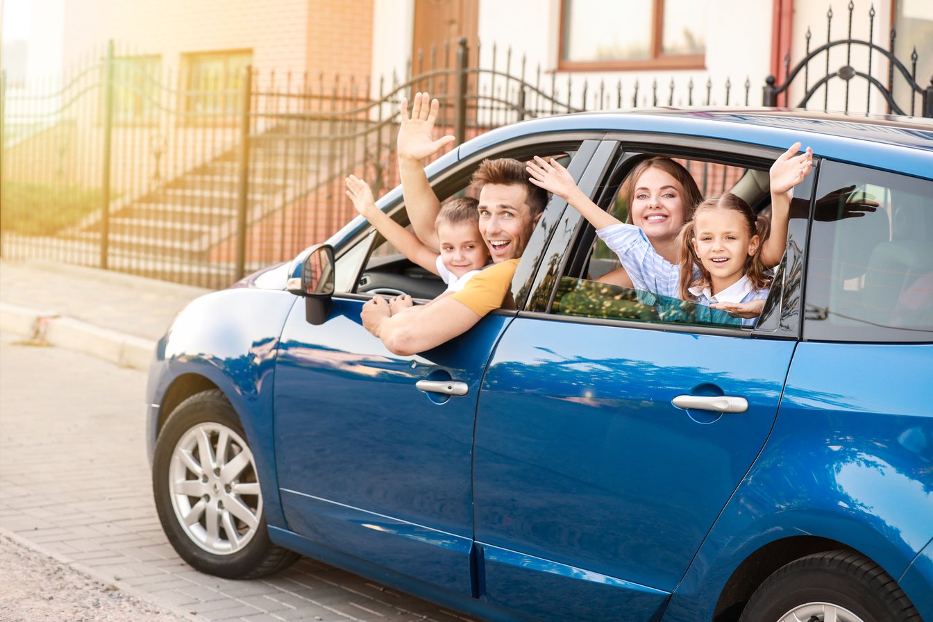 Happy Family Travelling by Car